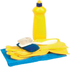Yellow rubber cleaning gloves, blue terry cloths, two dish scrubs and a bottle of dish detergent.